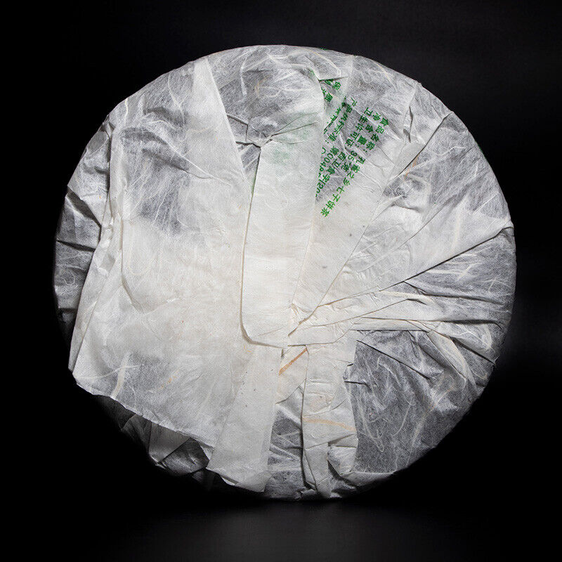 Bajiaoting Valley Flower Tea 357g Pu'er KONG QUE ZHI XIANG QI ZI BING