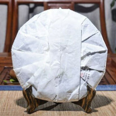 HelloYoung Mengku YUE CHEN YUE XIANG Cha Tea Qizi Bing Puerh Tea YunNan Cha Pu-erh Tea 357g