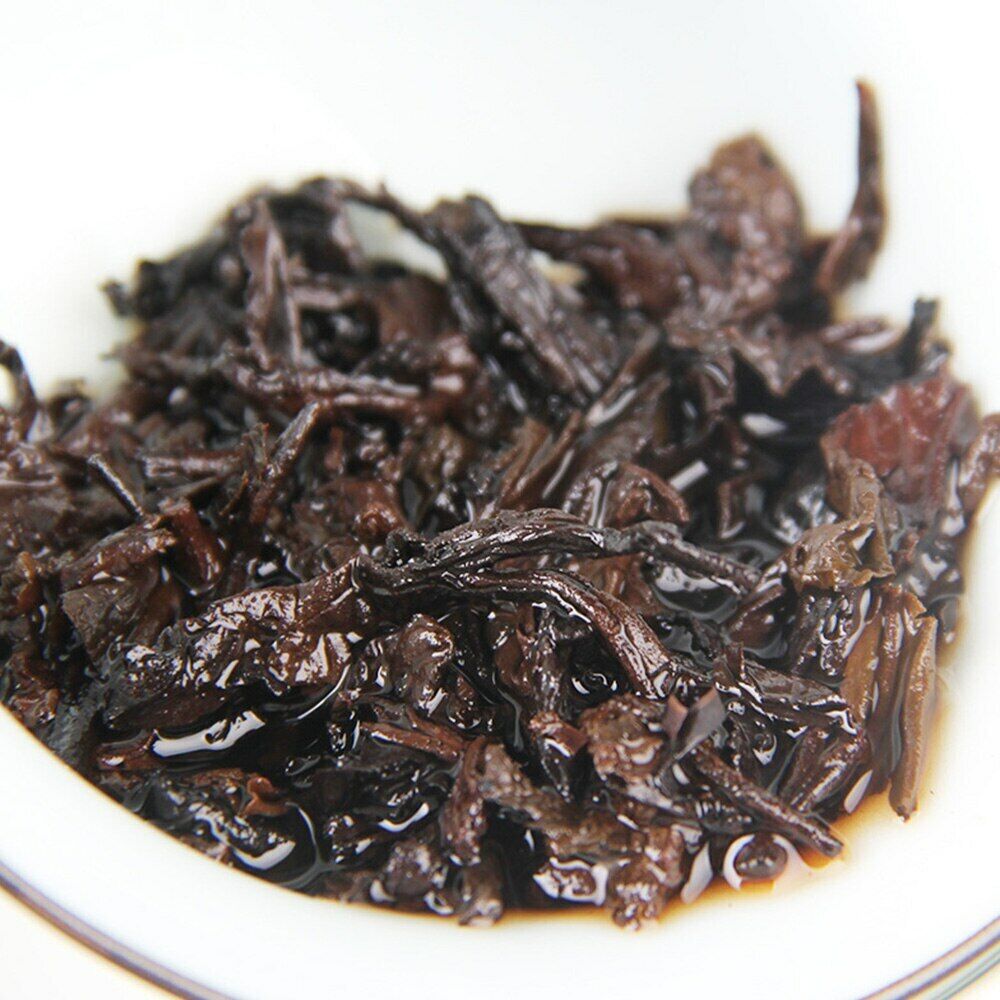 HelloYoung Shu Pu-erh Tea Palace and The Charm of Time Qi Zi Bing Ripe Puer Tea 357g